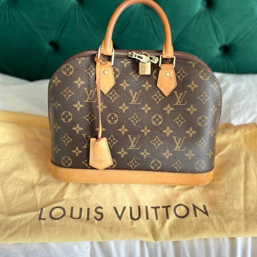 Authentic Louis Vuitton Alma PM hand bag